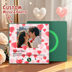 Personalized music and photo product with a couple and heart design on a wooden surface.