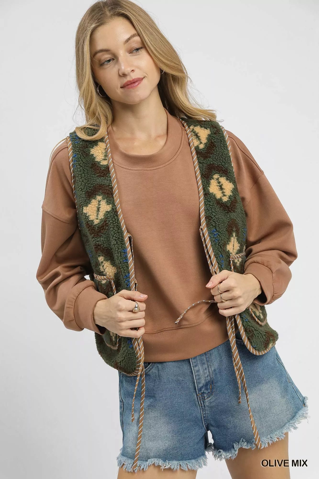 Umgee Mix Patterned Sherpa Tie-Front Vest 2 069f643c-ac1d-4714-a7c3-f4b7fbce1e9a-Max-Origin